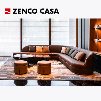 Set furnitur hotel termasuk sofa kulit dan meja kopi marmer